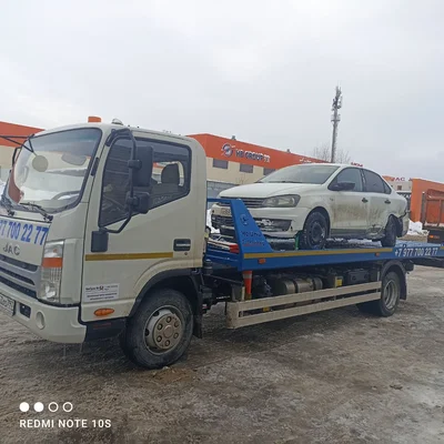 Эвакуация легкового автомобиля Ford на сдвижной платформе эвакуатора — услуга Гидрокар, Москва и Подмосковье
