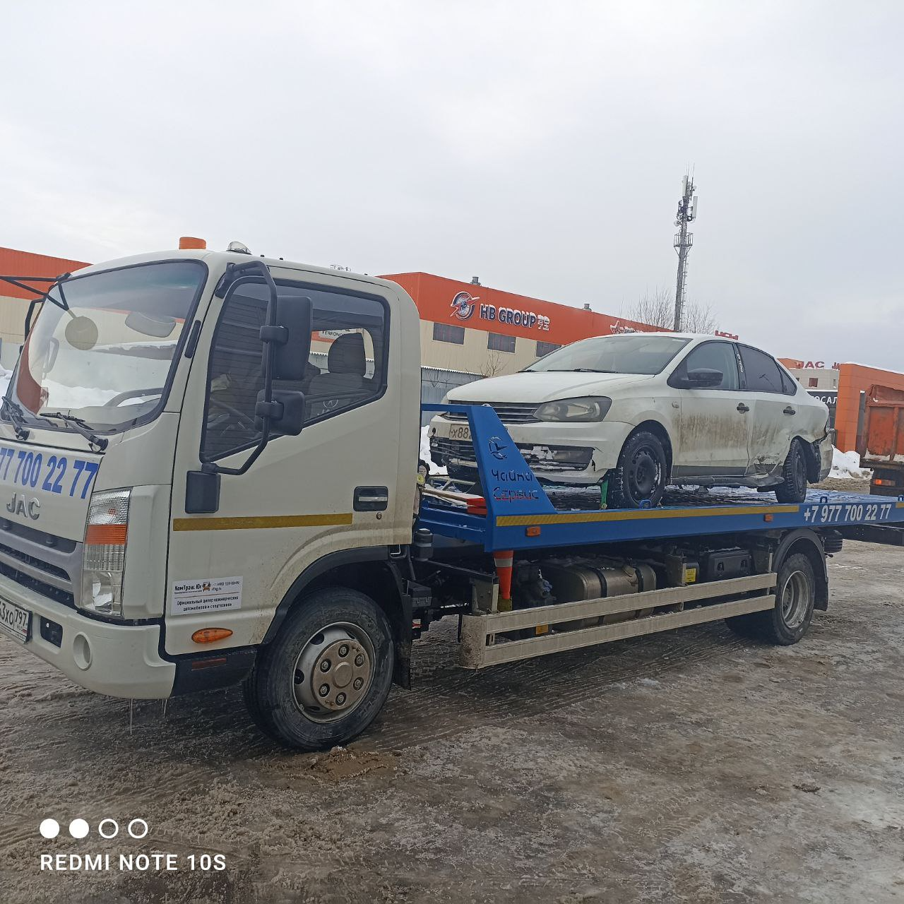 Эвакуация легкового автомобиля Ford на сдвижной платформе эвакуатора — услуга Гидрокар, Москва и Подмосковье